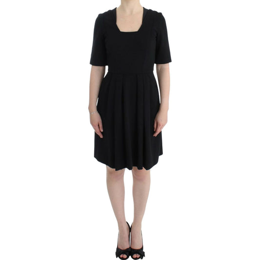 CO|TE Black short sleeve venus dress