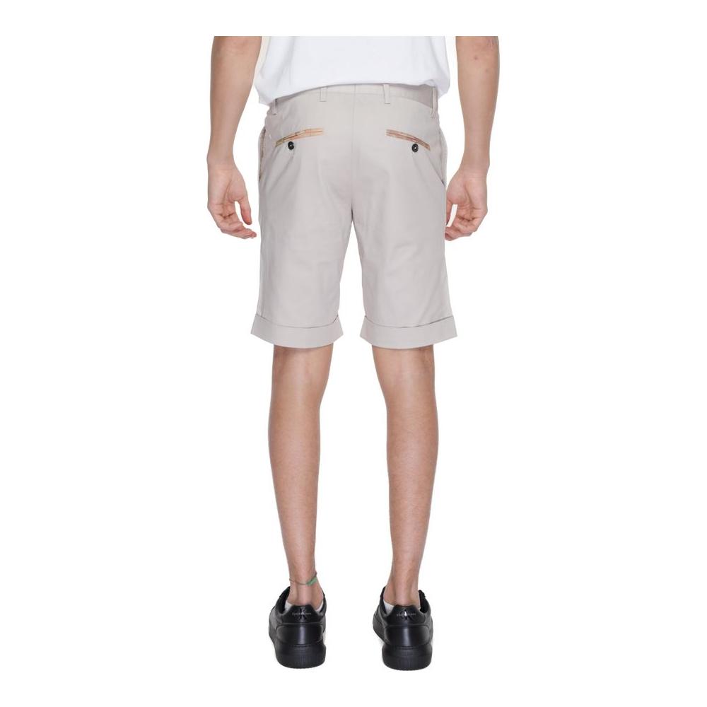 Back view of Alviero Martini Prima Classe beige cotton men's Bermuda shorts, part of the spring/summer collection.