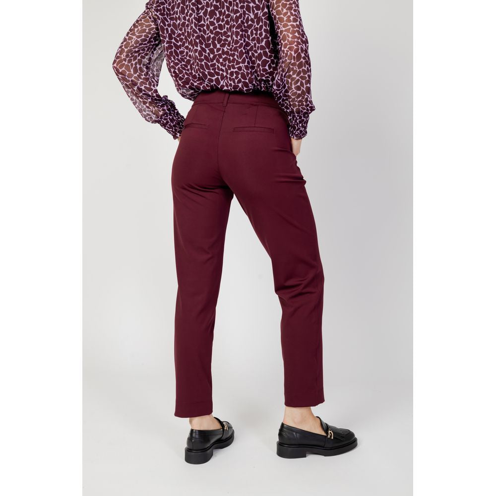 Woman wearing Street One Bordeaux Polyester Cigarette Pants, fall/winter collection, rear view highlighting the rich color and fit.