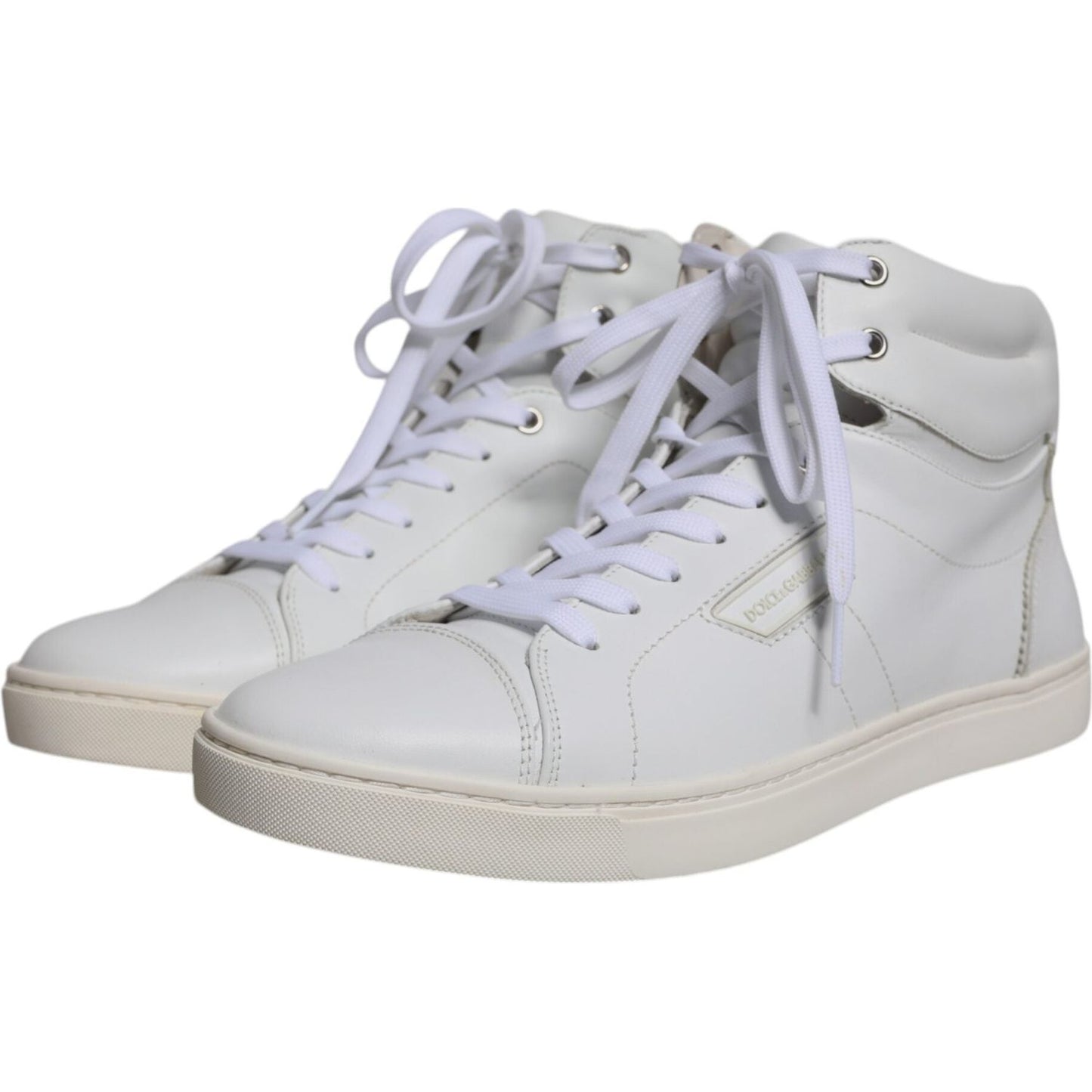 Dolce & Gabbana white leather mid-top men's sneakers with lace-up closure and rubber sole, featuring logo details, made in Italy.