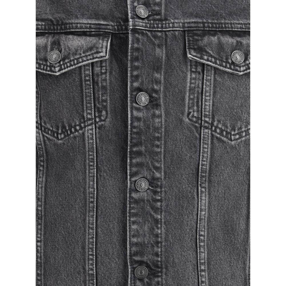 Close-up of 7FOR Perfect Koto Denim Jacket with button closure and flap pockets, showcasing classic monochrome design.