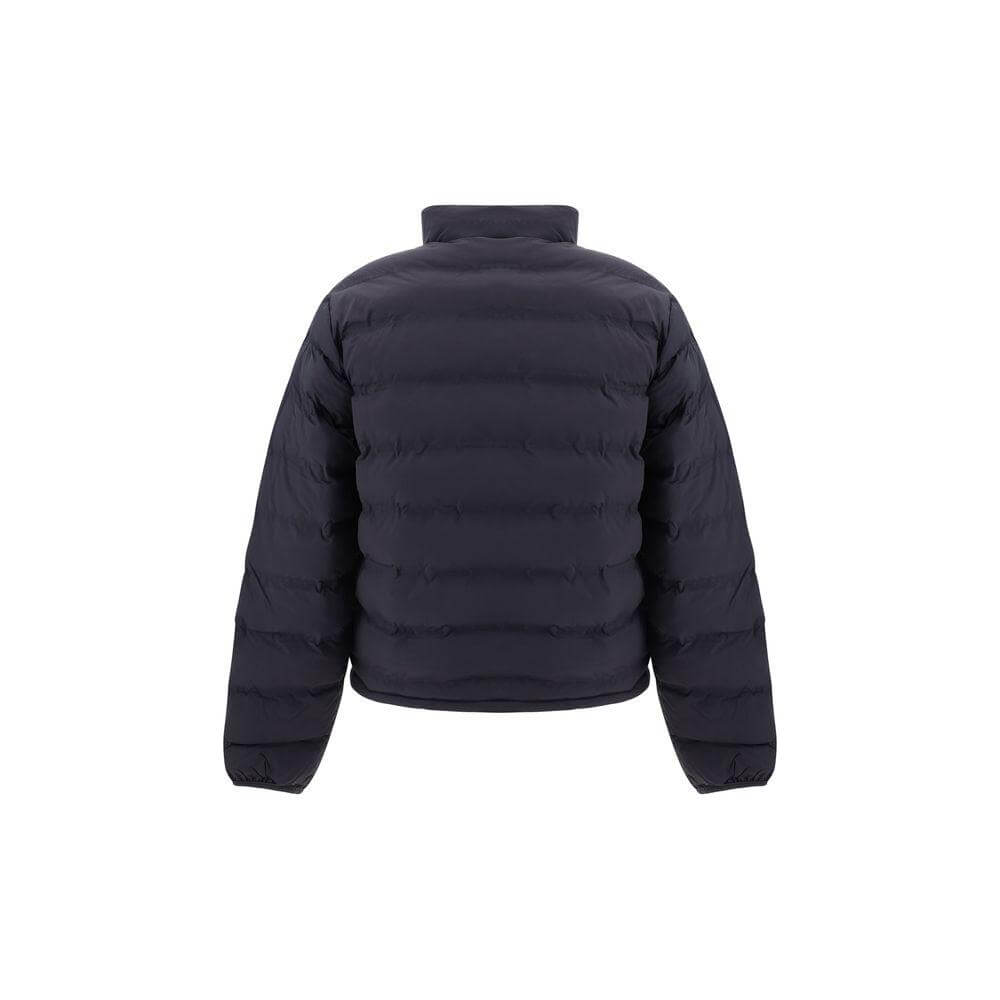 Back view of a black Daily Paper Down Jacket with quilted design and elastic cuffs, showcasing a monochrome pattern and regular fit.