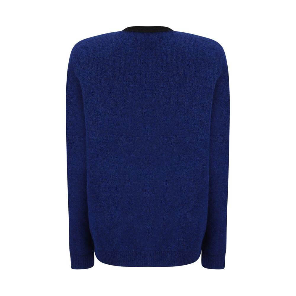 Back view of blue alpaca cardigan by Alessandra Rich with ribbed cuffs, contrasting crew neck, and ribbed hem.
