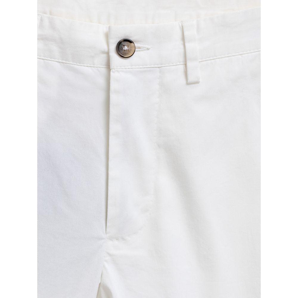 Dolce & Gabbana white cotton Bermuda shorts with button and zip closure, featuring side and back pockets, stretch fabric.