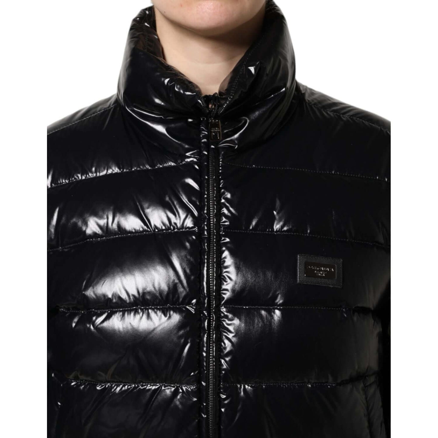 Dolce & Gabbana black full zip puffer jacket with logo plaque, made of nylon and polyurethane, exclusive high craftsmanship. Luxury fashion.