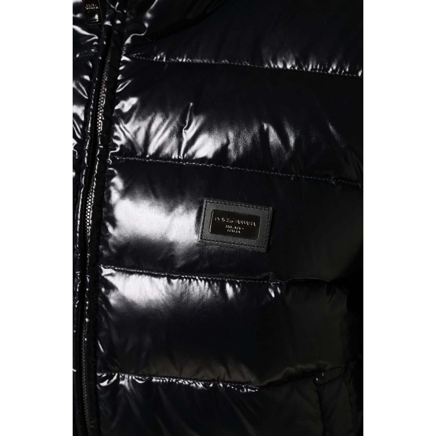 Dolce & Gabbana black puffer jacket with logo plaque, full zip closure, made of nylon and polyurethane, exclusive Italian craftsmanship.