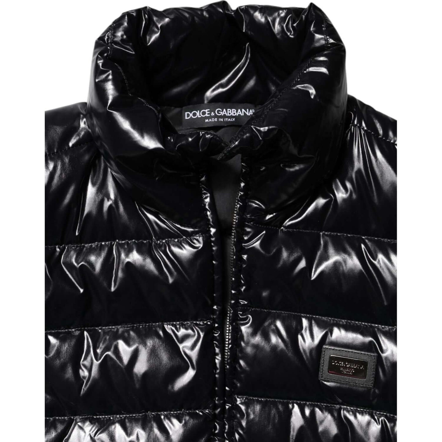 Dolce & Gabbana black puffer jacket with logo plaque, nylon-polyurethane blend, full zip closure, made in Italy, luxurious design.