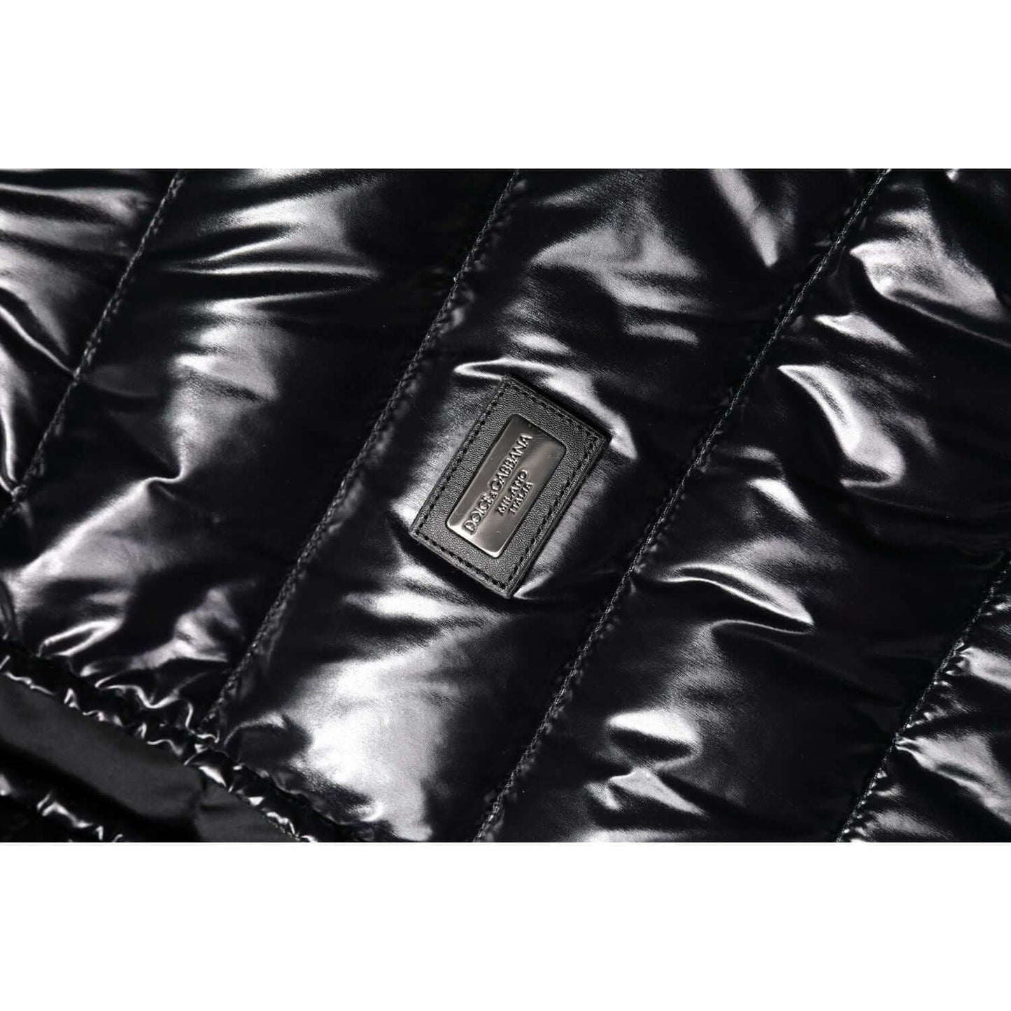 Dolce & Gabbana black puffer jacket with logo plaque, full zip, made of nylon and polyurethane for high craftsmanship