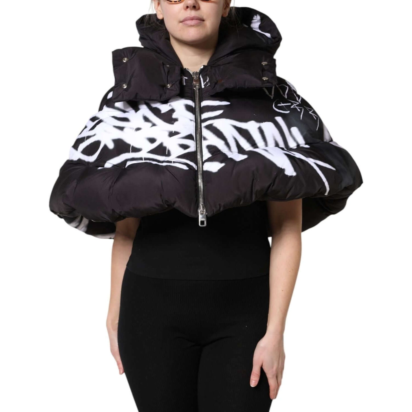 Dolce & Gabbana black padded hooded cropped jacket with full zip and white graffiti design on front. 100% Nylon, made in Italy.