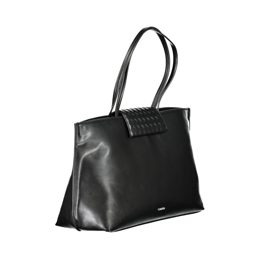 Calvin Klein Black Polyester Handbag with two shoulder handles, internal pocket, contrast details, and logo.