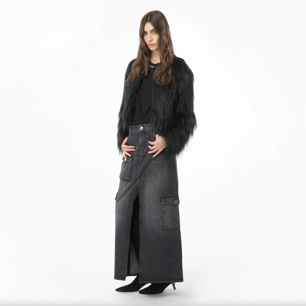 Model wearing PINKO Black Cotton Skirt with zip closure, back pockets, flap pockets, and side pockets, styled with a black top and jacket.