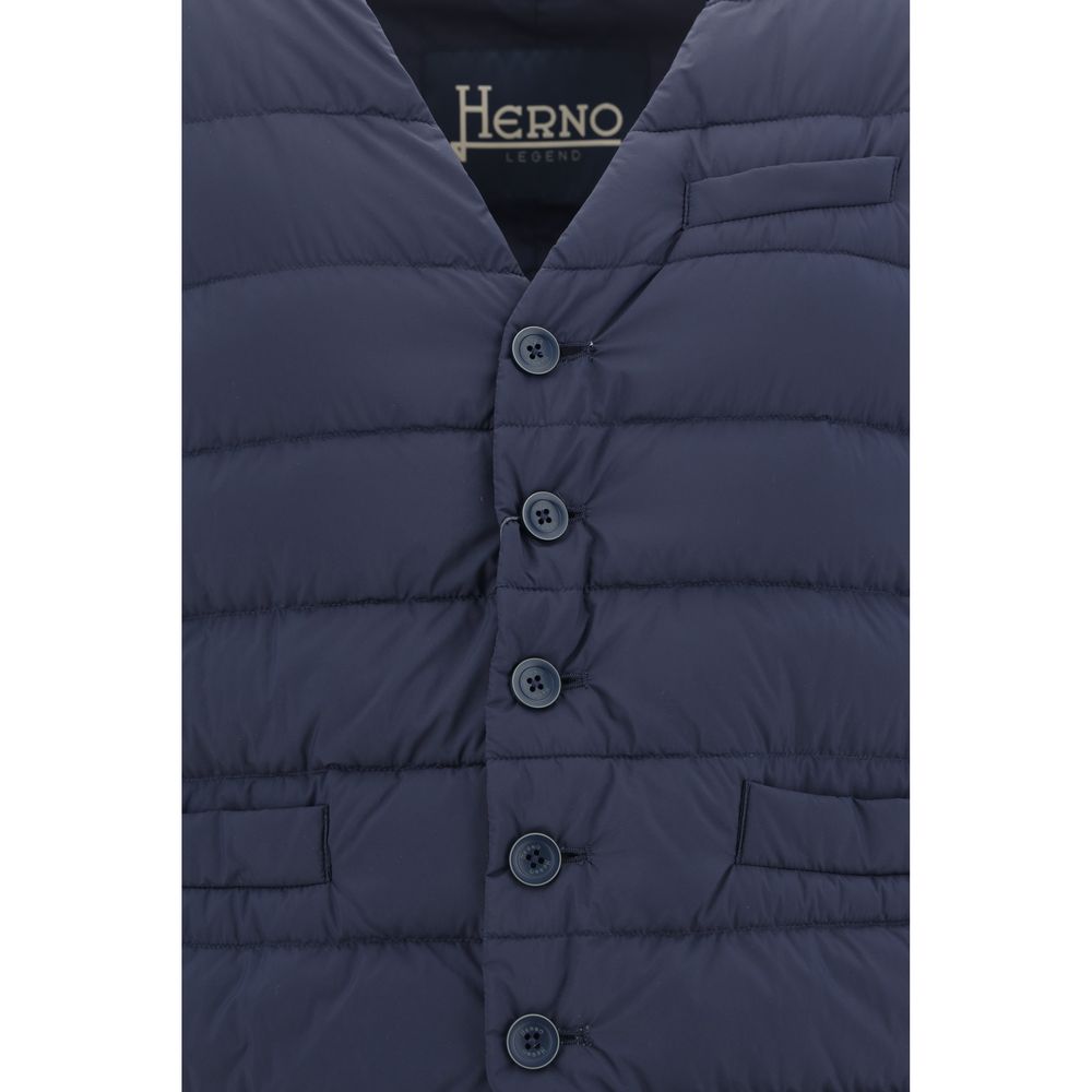 Herno Blue Polyamide Sleveless Jacket with v-neck, button closure, two front welt pockets, quilted design, and adjustable waistband.