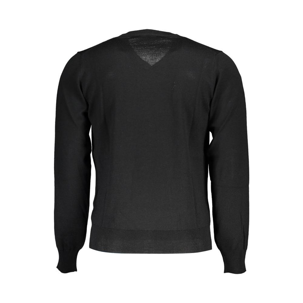 K-WAY V-Neck Woolen Masterpiece SweaterEmbrace timeless elegance and superb comfort with this exquisite long-sleeved V-neck sweater, adorned with a signature application and logo. Made from the finest 100% Wool, it provides unparalleled warmth and softnes