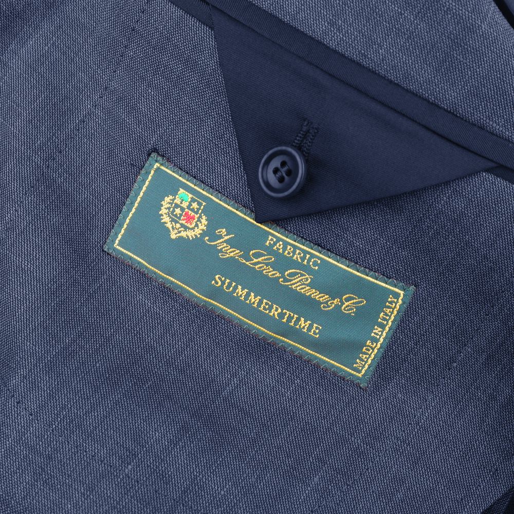 Made in Italy Blue Linen Blazer with Loro Piana fabric label, showing navy blue color and double-breasted design.
