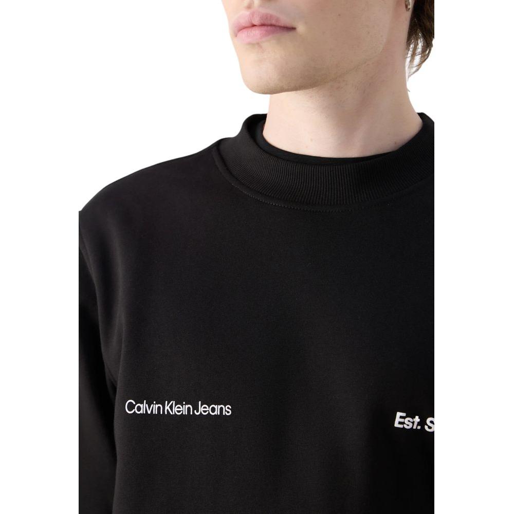Calvin Klein Jeans black cotton sweater featuring minimalist design and logo detailing, ideal for casual outfits.
