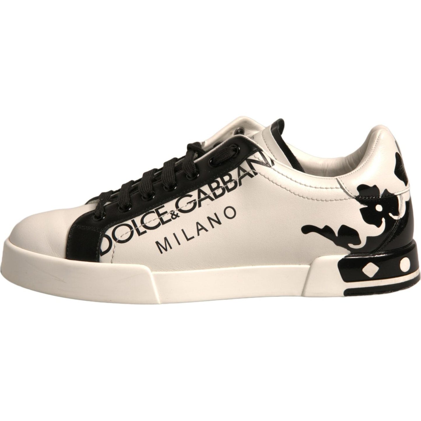 Dolce & Gabbana low-top leather sneakers in white and black with logo details and crown design.
