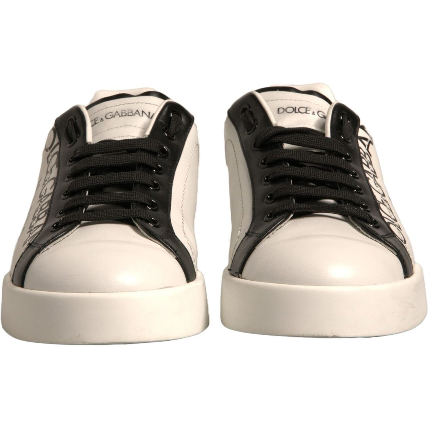 Dolce & Gabbana white and black leather low-top sneakers with crown details and lace-up closure.