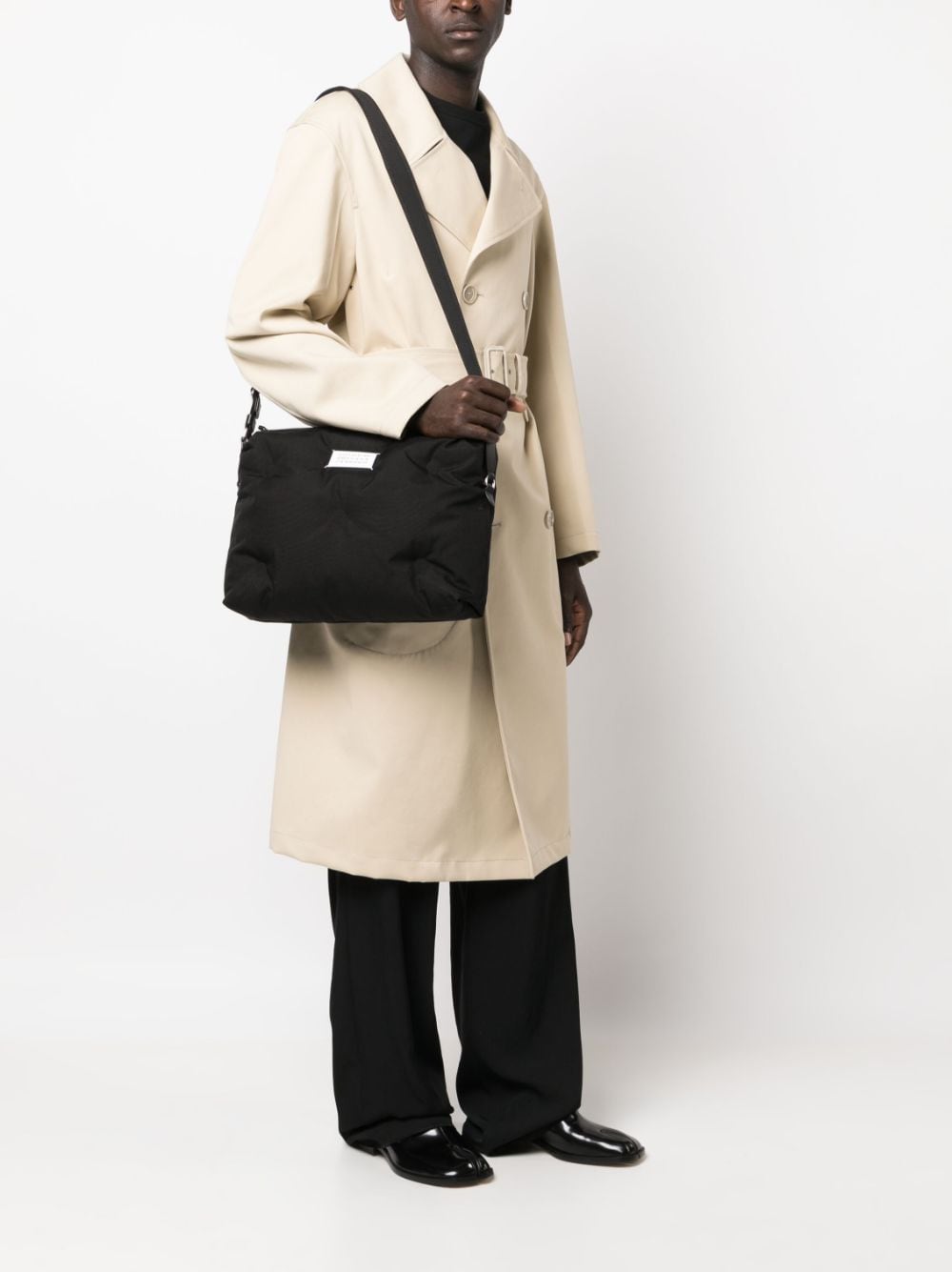 Front view with bag zipped and handles upright.
