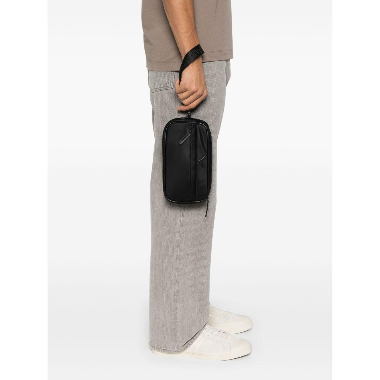 Front view with bag zipped and handles upright.