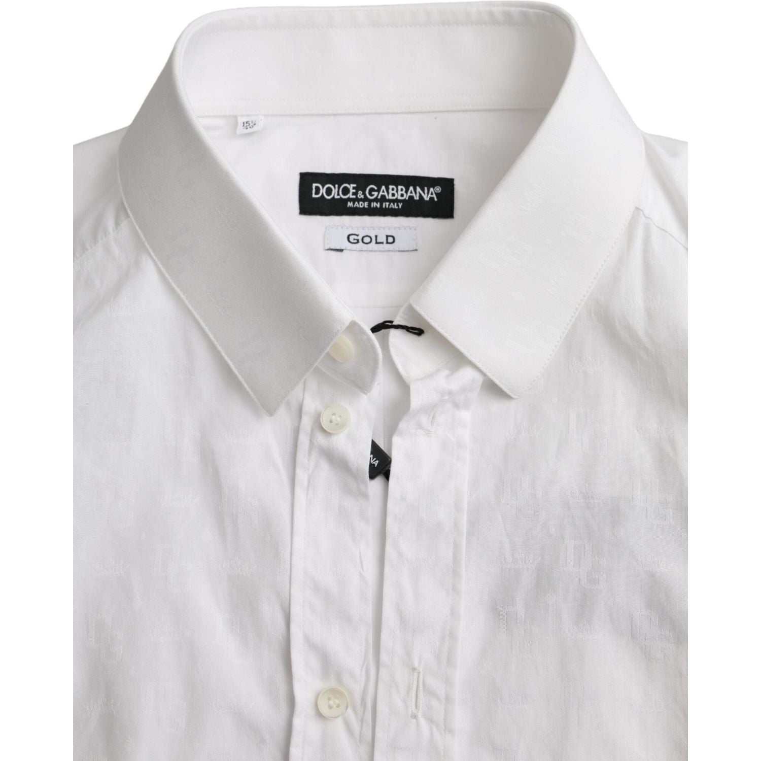 فستان دولتشي آند غابانا من القطن الأبيض بأكمام طويلة وقميص ذهبي