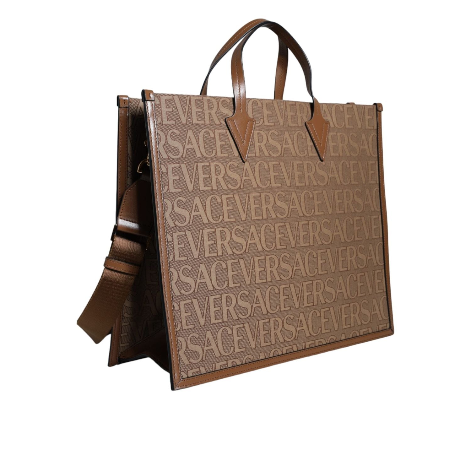 حقيبة كروس بودي من فيرساتشي باللون البني بمقبض علوي من الجلد المزخرف بشعار