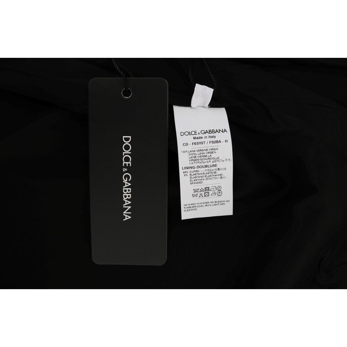 فستان دولتشي آند غابانا الأنيق المصنوع من الصوف بدون أكمام ومنقط بالبولكا