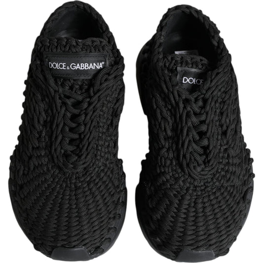 Dolce & Gabbana black knitted Daymaster sneakers, front view, featuring logo details and lace-up closure, made in Italy.