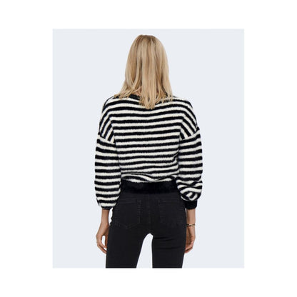 Back view of a woman wearing the Only Black And White Marabou Sweatshirt with striped design, showcasing a stylish and casual look.