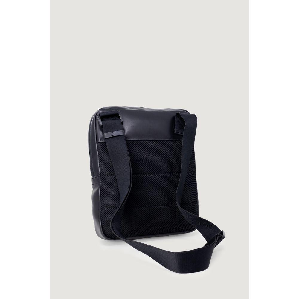 Front view with bag zipped and handles upright.