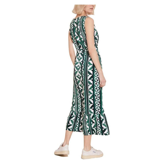 Woman wearing Street One green viscose dress with geometric pattern, perfect for spring and summer fashion.