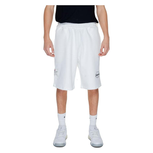 White men's Bermuda shorts, 100% cotton, part of Underclub Spring/Summer collection, modeled by standing person.