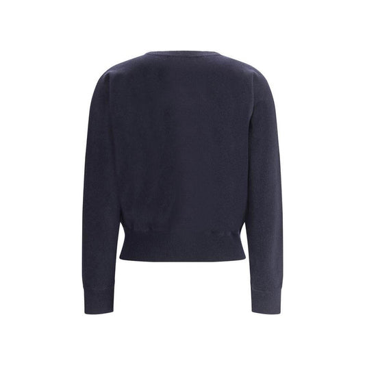 Back view of Extreme Cashmere Belle Sweater featuring ribbed crew neck, cuffs, and hem for an elegant and versatile look.