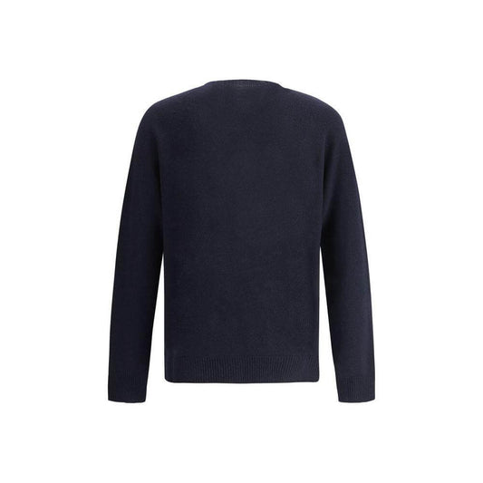 Jil Sander virgin wool seamless sweater, monochrome with ribbed crew neck, cuffs, and hem, shown in a regular fit from the back view.