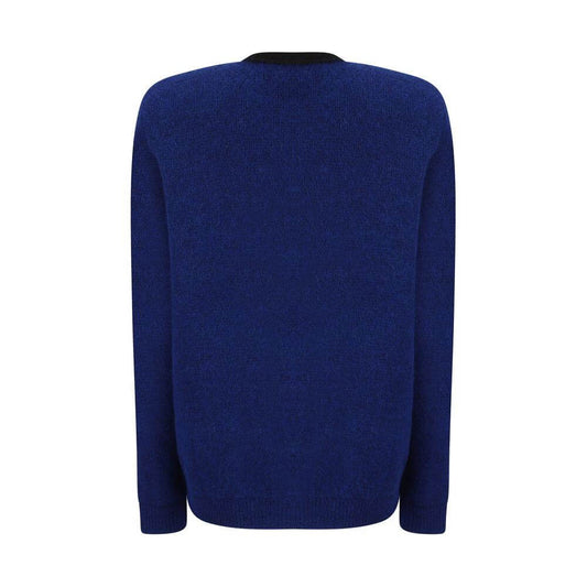 Back view of blue alpaca cardigan by Alessandra Rich with ribbed cuffs, contrasting crew neck, and ribbed hem.