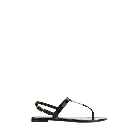 Saint Laurent Black Calf Leather Bos Taurus Flat Sandals with monogram detail, ankle strap, side buckle, and flip-flop design.