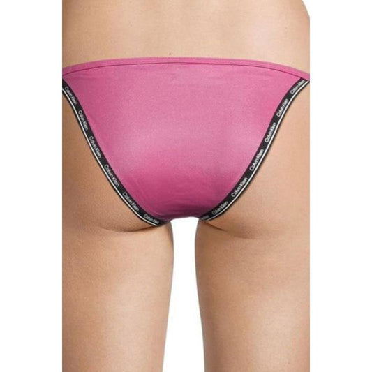 Calvin Klein Jeans Pink Polyester SwimwearDiscover the String Side Tie bikini bottom for women by Calvin Klein Jeans, an essential piece for your summer wardrobe. Made from 78% polyamide and 22% elastane, this bottom offers a great fit and comfort, perfec