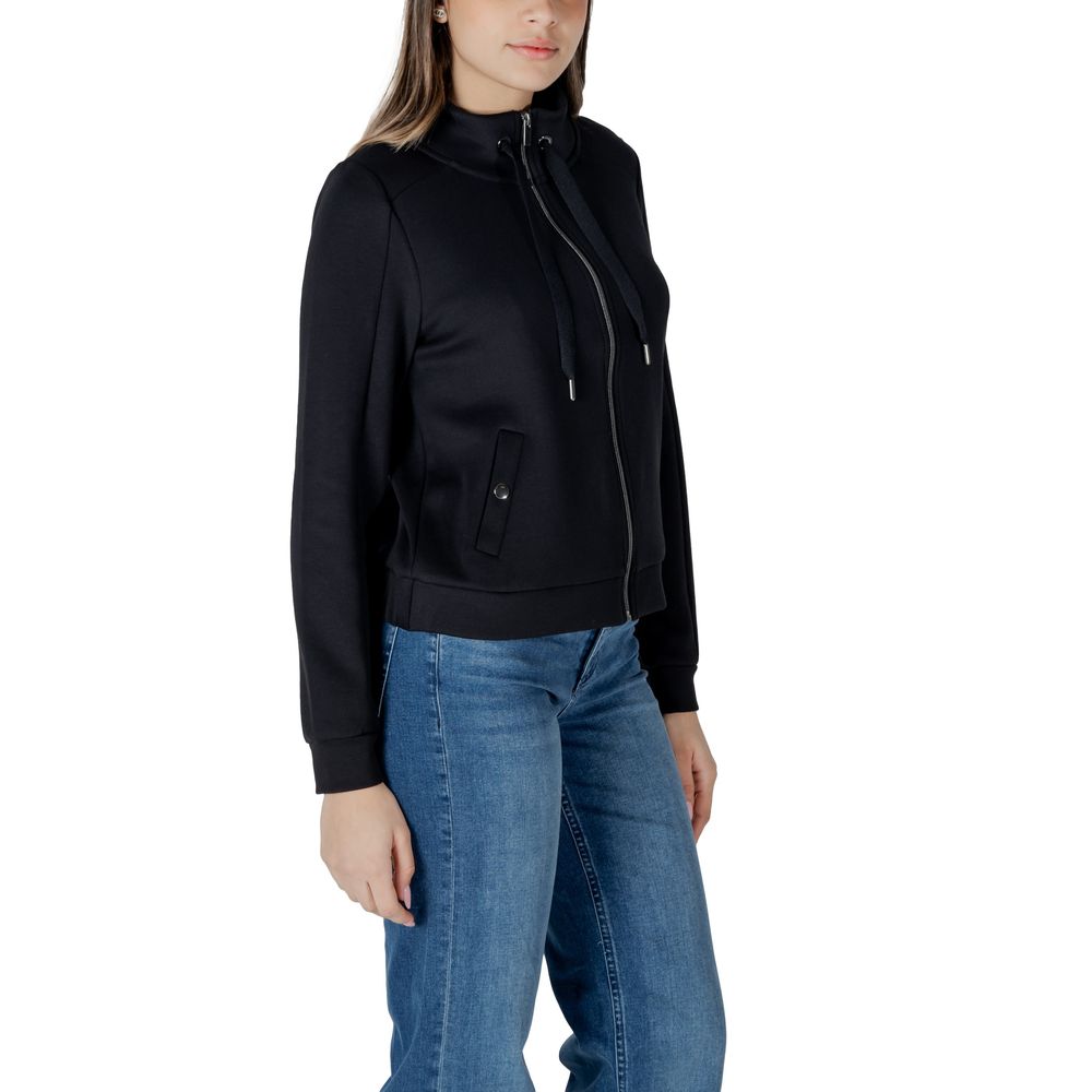 Front view with bag zipped and handles upright.
