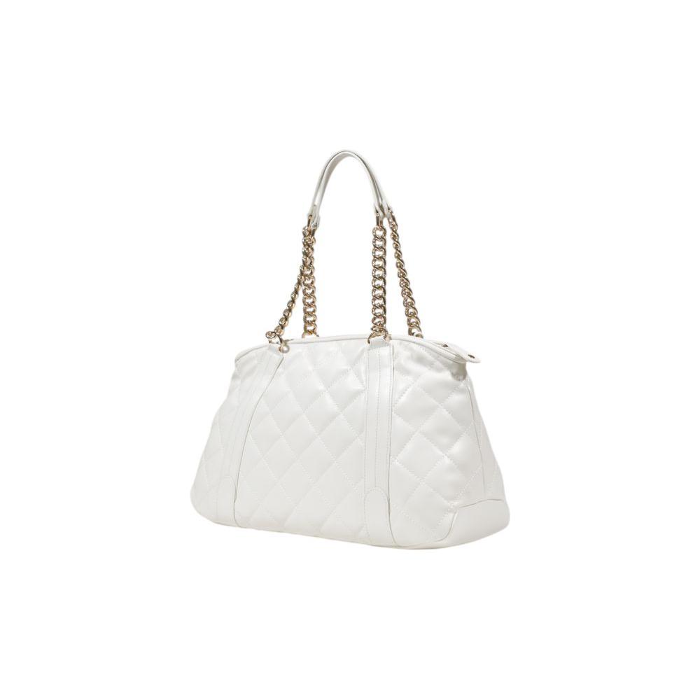 Front view with bag zipped and handles upright.