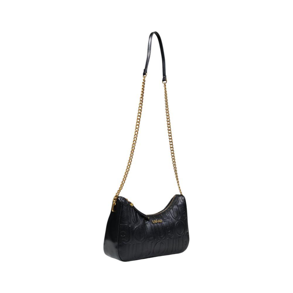 Front view with bag zipped and handles upright.