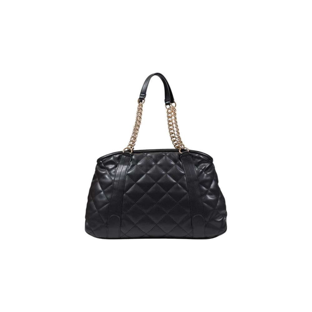 Front view with bag zipped and handles upright.