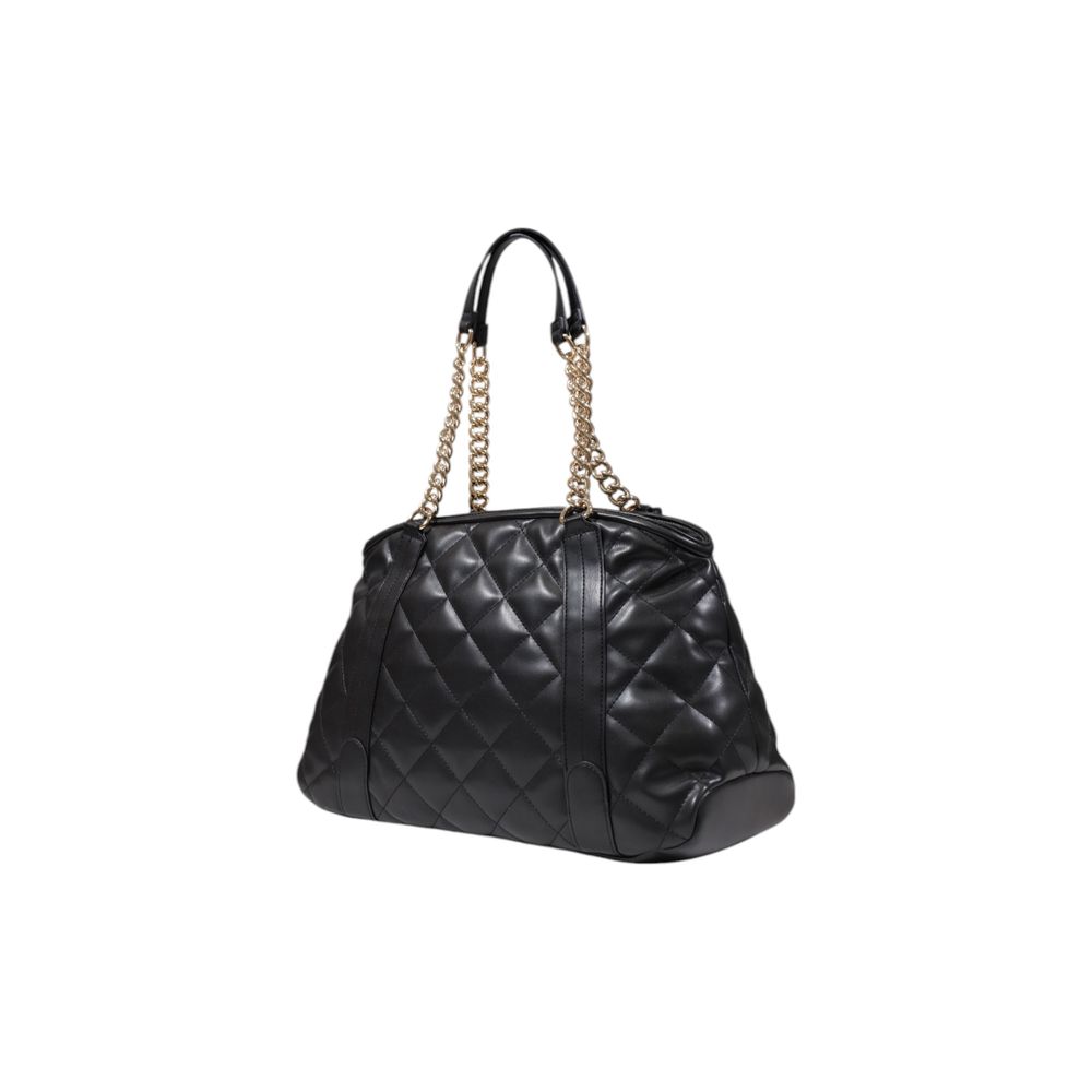 Front view with bag zipped and handles upright.