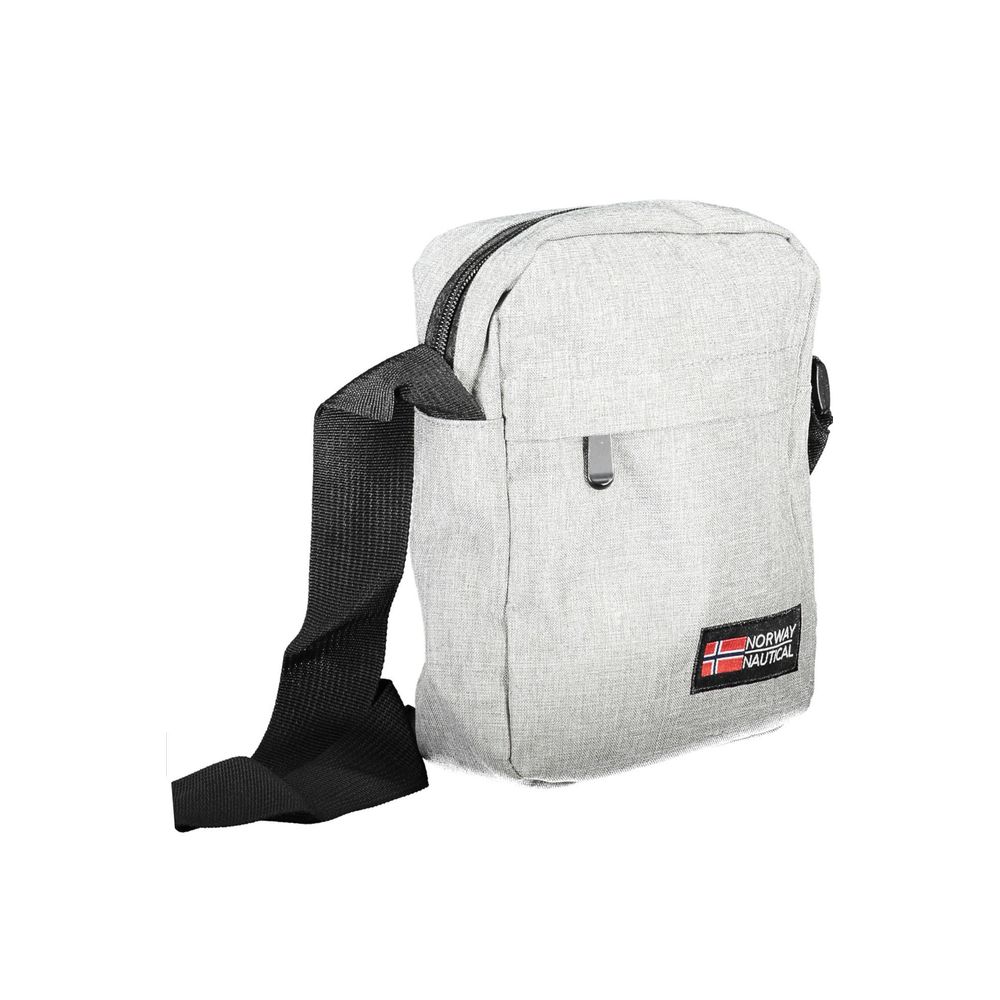Front view with bag zipped and handles upright.