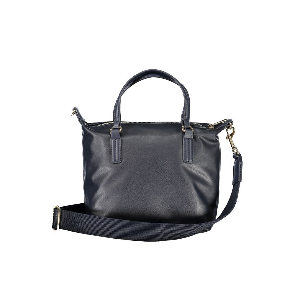 Front view with bag zipped and handles upright.