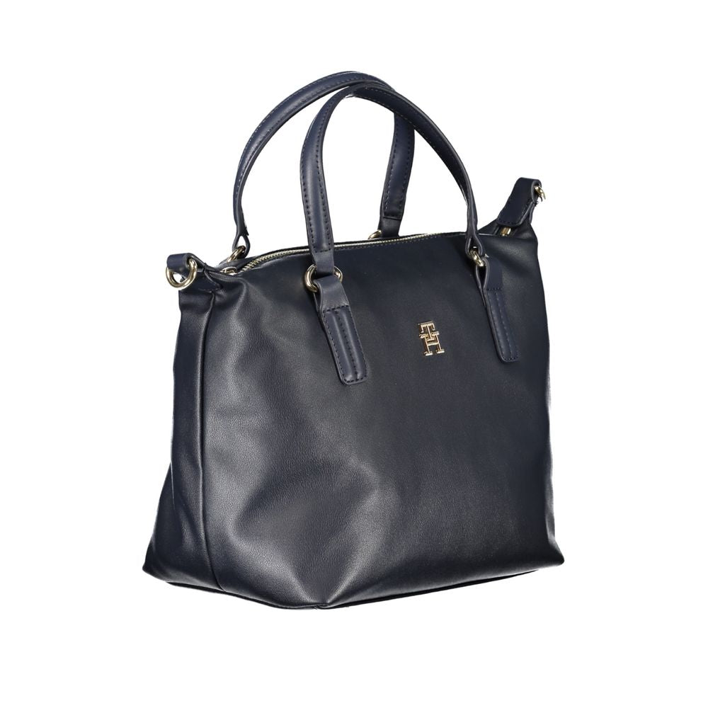Front view with bag zipped and handles upright.