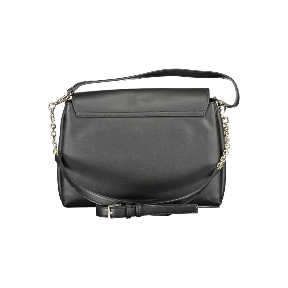 Front view with bag zipped and handles upright.