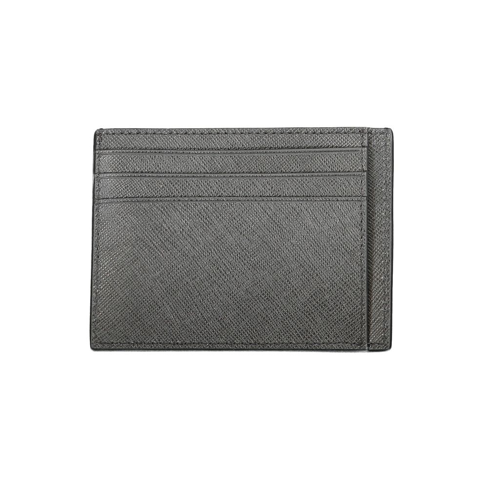 Calvin Klein Black Leather Wallet with card holder, central pocket, double card spaces, and logo detailing.
