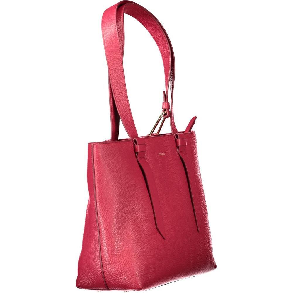 Front view with bag zipped and handles upright.