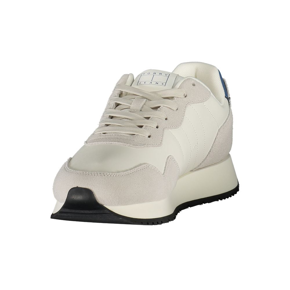 Tommy Hilfiger White Leather Men Sneaker with blue accents, removable insole, and iconic branding