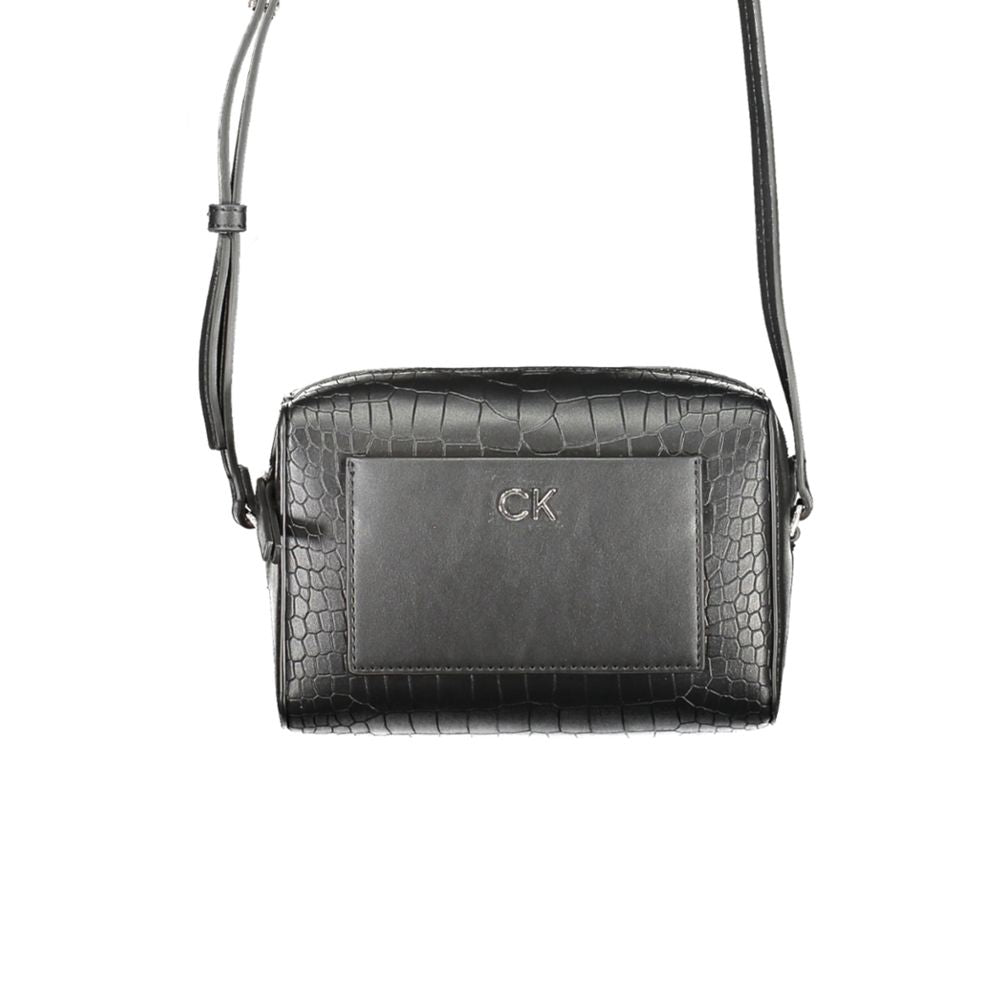 Calvin Klein Black Polyester Handbag with adjustable strap, external pocket, zip closure, and logo detail made from recycled material.