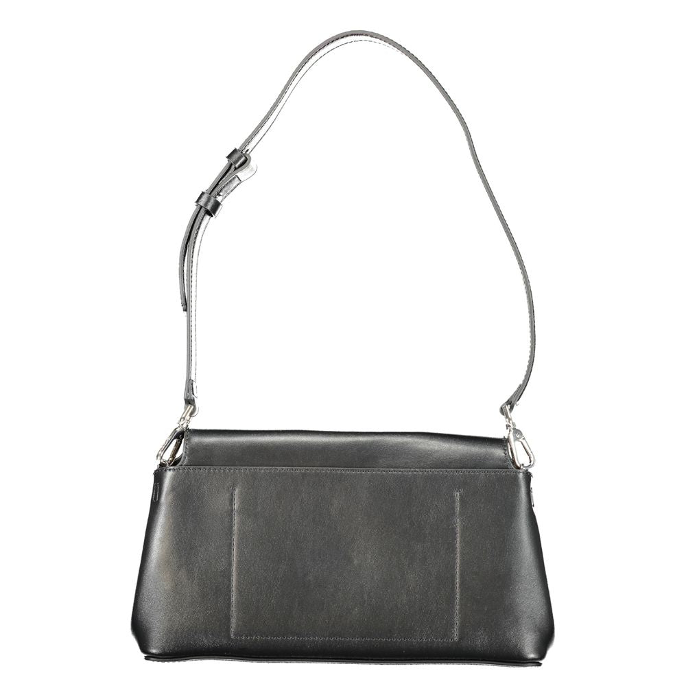 Calvin Klein Black Polyester Handbag with adjustable strap and snap closure, featuring logo design, made from 50% recycled materials.